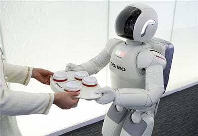 asimo est le petit robot conçu par honda