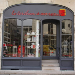 le torchon à carreaux est une enseigne d'arts de la table.